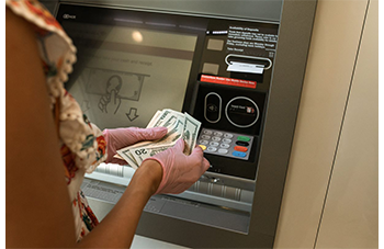 Woman using an ATM