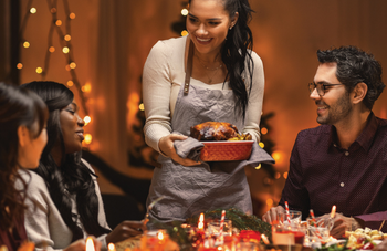 People gathering around a holiday meal