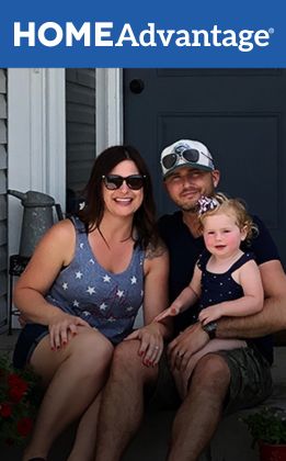 Family in front of house