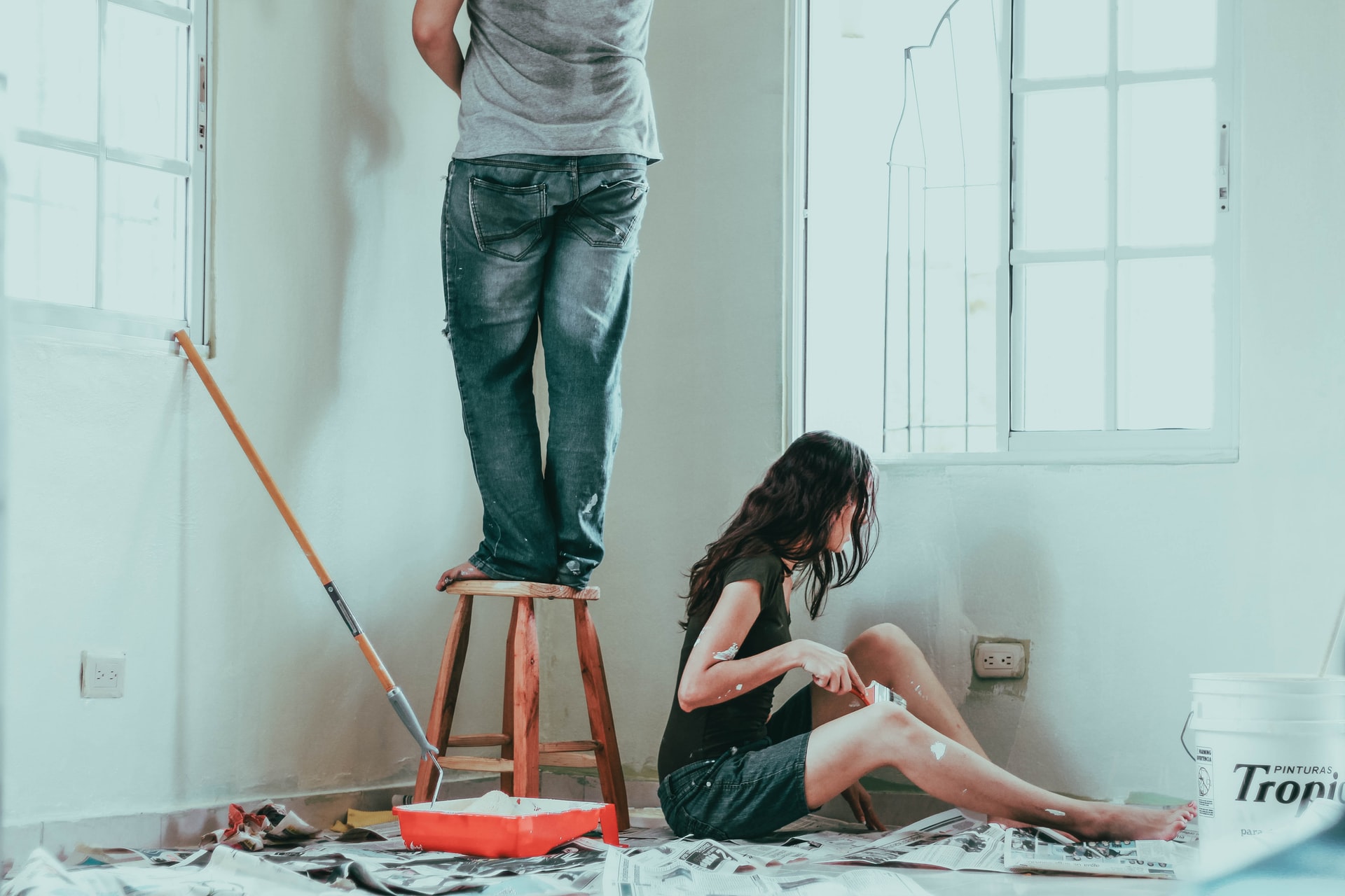 couple painting house